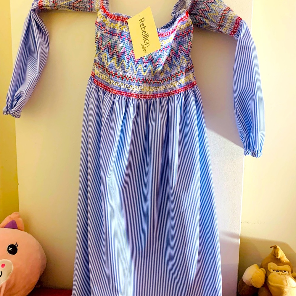 Never used! New tags! I gain weight so now I can’t used it :(. Small size!